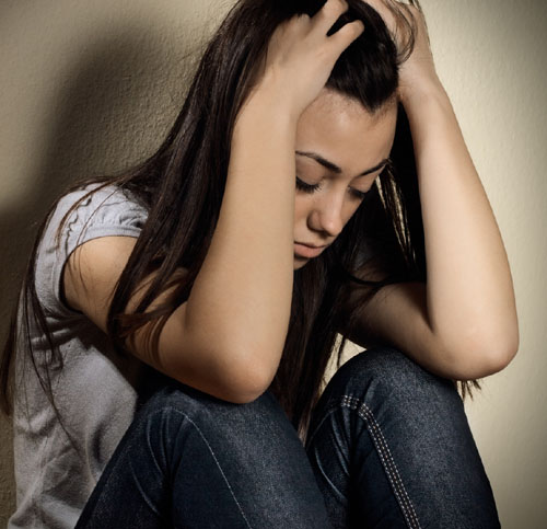 בתמונה אישה בדיכאון