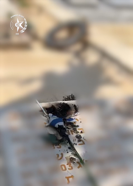 השחית קבר צבאי. תיעוד- קרדיט: דוברות המשטרה